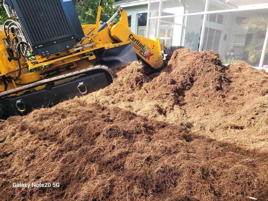 Finished job with mulch pile